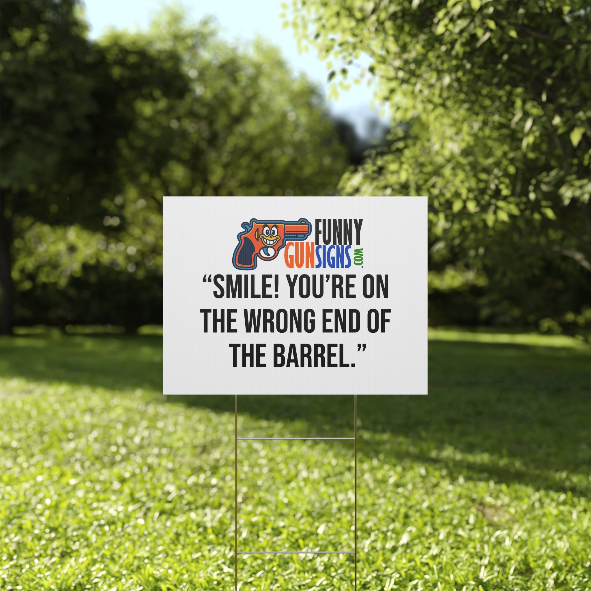 “Smile! You’re on  the wrong end of  the barrel.” | Funny Gun Signs