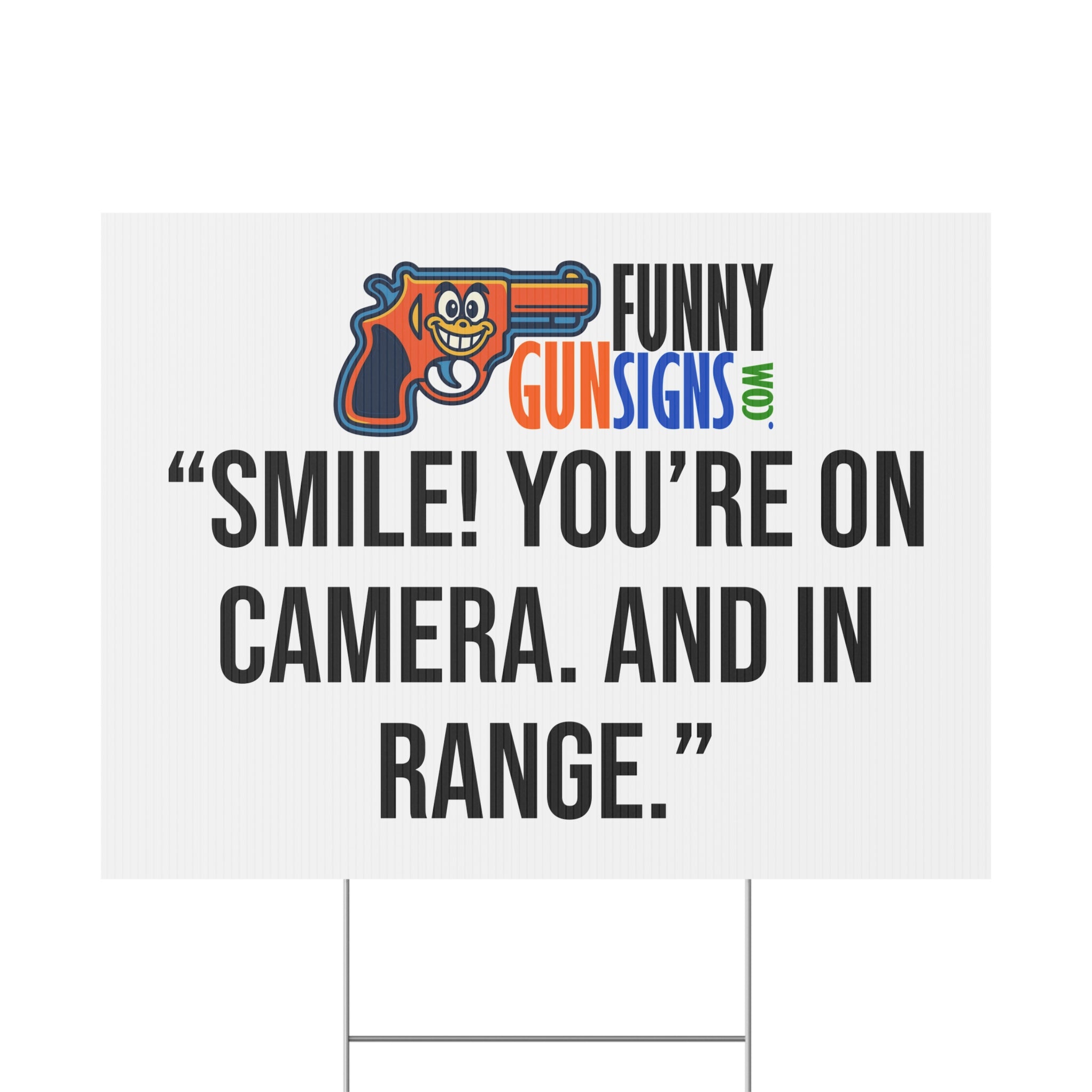 “Smile! You’re on camera. And in range.” FUNNY GUN SIGNS