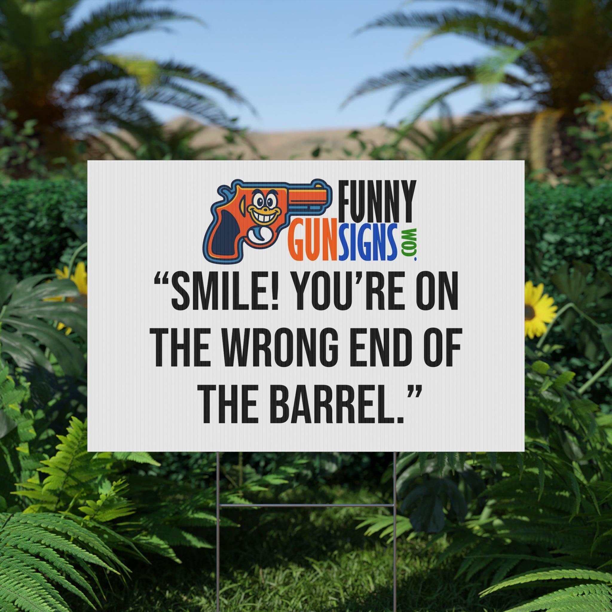 “Smile! You’re on  the wrong end of  the barrel.” | Funny Gun Signs